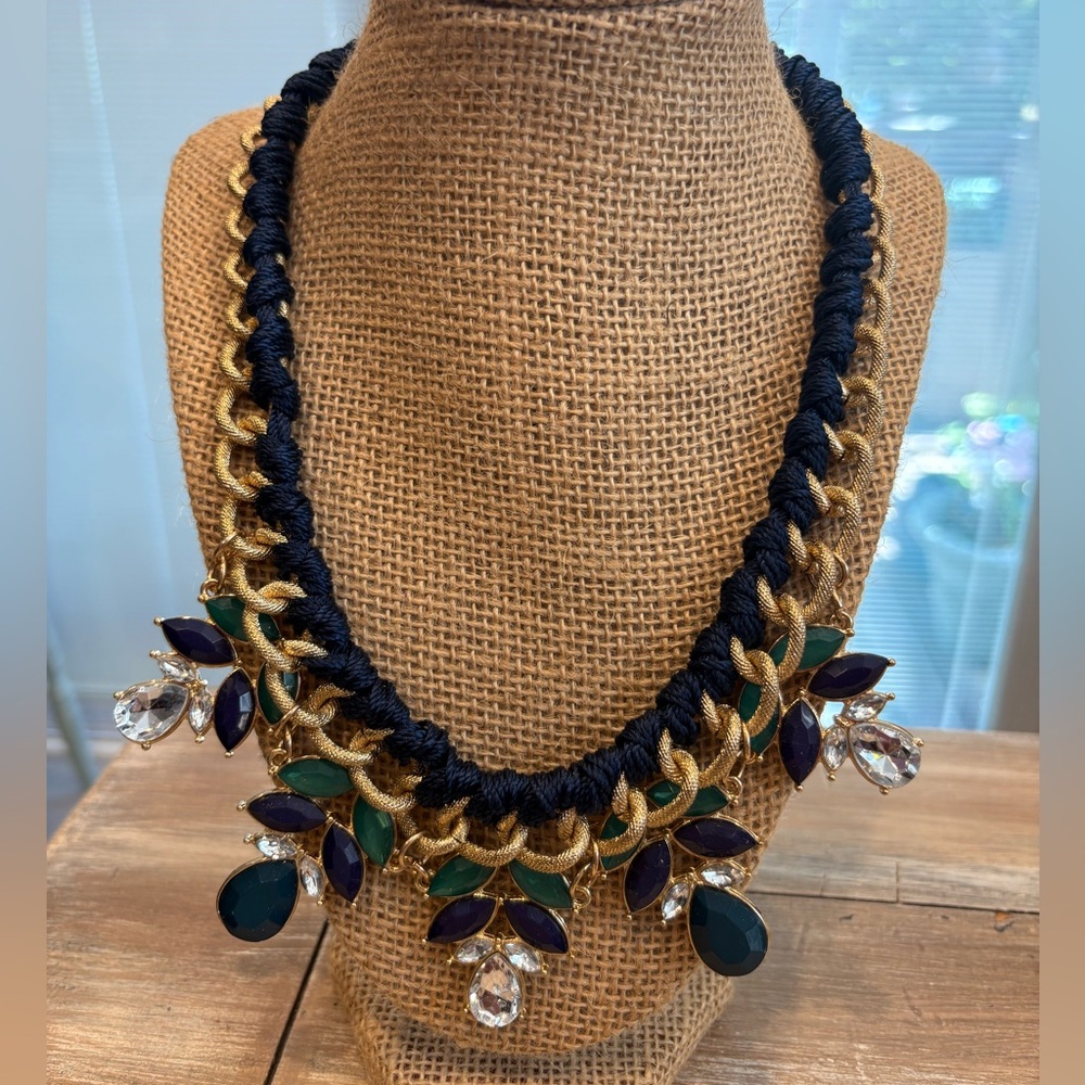 Elegant Gold and Navy Necklace with Green Accents